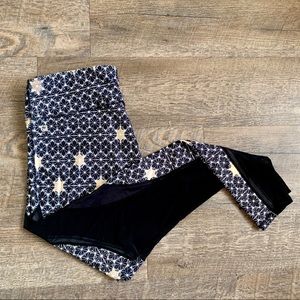 Fabletics Navy Blue, White, and Gold Star Leggings